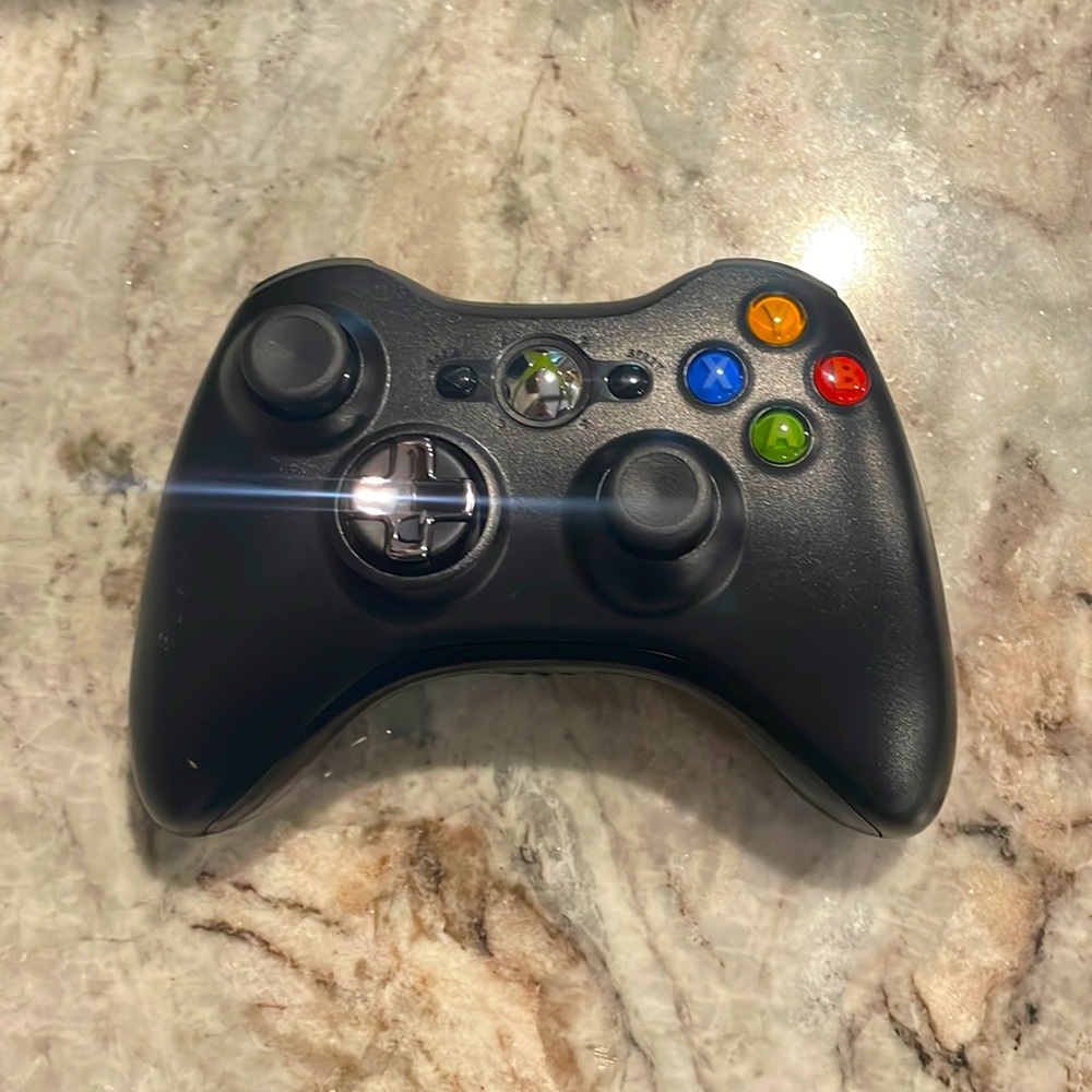 Xbox 360 gaming controller. Battery pack not included